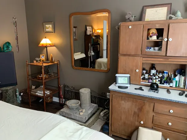 A warm, lived-in treatment room at Bridge to Health Healing Arts Center, Chattanooga